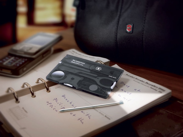 Швейцарская карточка VICTORINOX SwissCard Lite, 13 функций, полупрозрачная чёрная Швейцарская карточка VICTORINOX SwissCard Lite, 13 функций, полупрозрачная чёрная